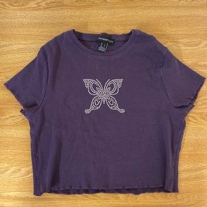 Purple, butterfly bedazzled, crop top. Lightly warn.